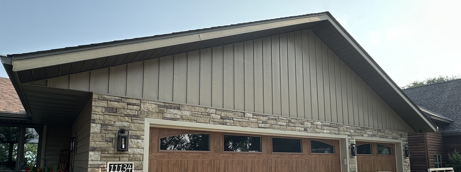 Cold Spring Lake Home Seamless Steel Siding & Screen Room