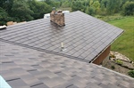 Asphalt Shingles vs. Metal Roofing for Minnesota Homes