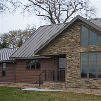 Comparing Asphalt Shingles vs. Metal Roofing for Minnesota Winters